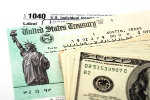 Tax return check and money